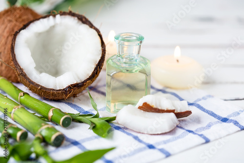 Relax and spa theme. Coconut, coconut oil, bamboo, candles, massage brush