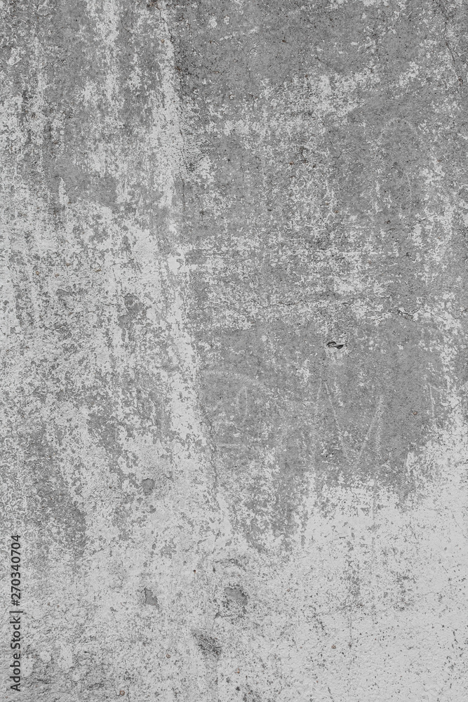 The texture of the old grey concrete wall with scratches, cracks, dust, crevices, roughness, stucco. Can be used as a poster or background for design