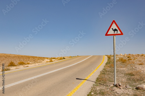 Be aware of camels passing sign