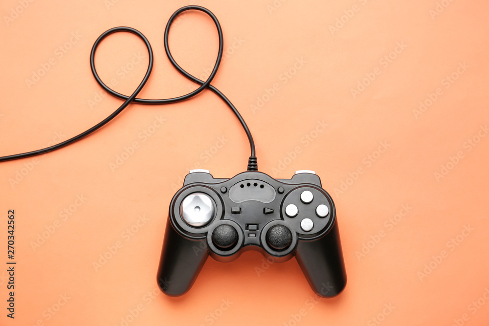 Modern game pad on color background Modern game pad on color background