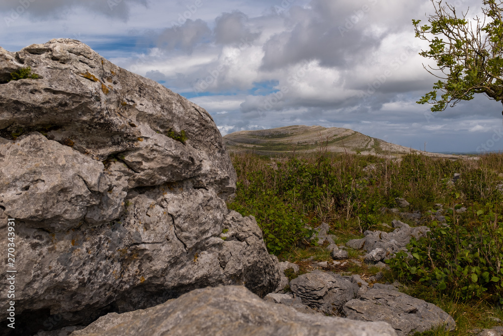 A view of The Burren National Park from the the start of the hikes and looking ahead to the Mullaghmore Mountain, nobody in the image