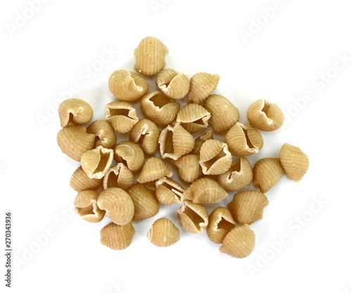 Wholemeal pasta on a white background 