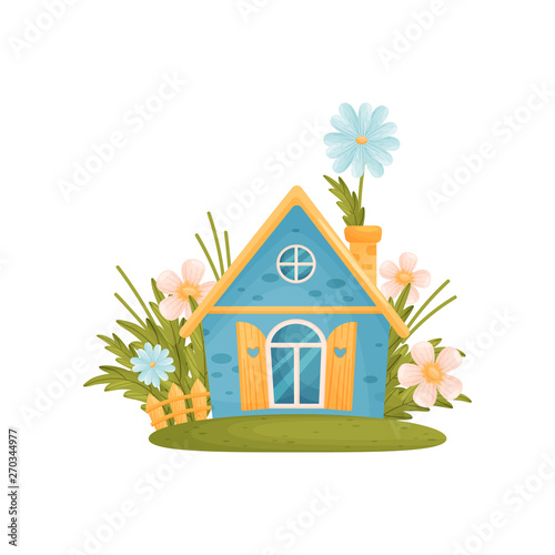 Fabulous blue house with a sharp roof among the flowers. Vector illustration on white background.