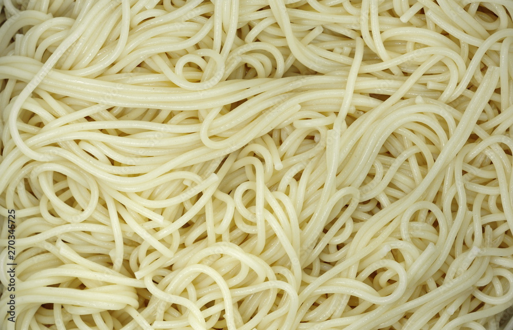 Spaghetti - Plain Italian spaghetti pasta background. Spaghetti - Plain Italian spaghetti pasta background.