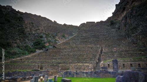 Terraces of Pumatallis in Ollantaytambo archaeological site, Cuzco, Peru photo