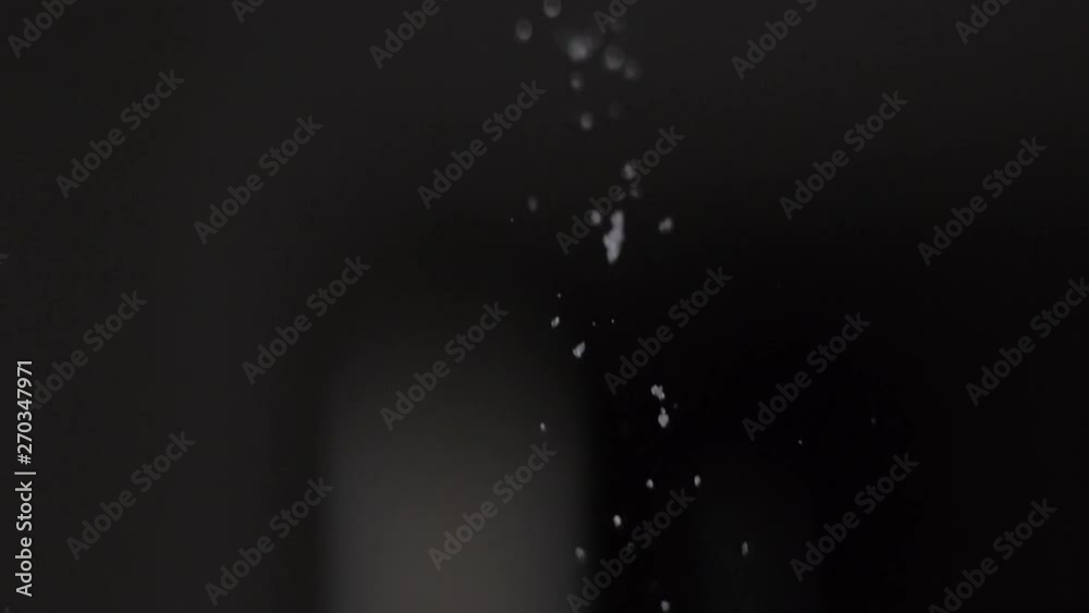 SLOW MOTION closeup of a hand with Sugar 2nd take SLOW MOTION closeup of a hand with Sugar 2nd take