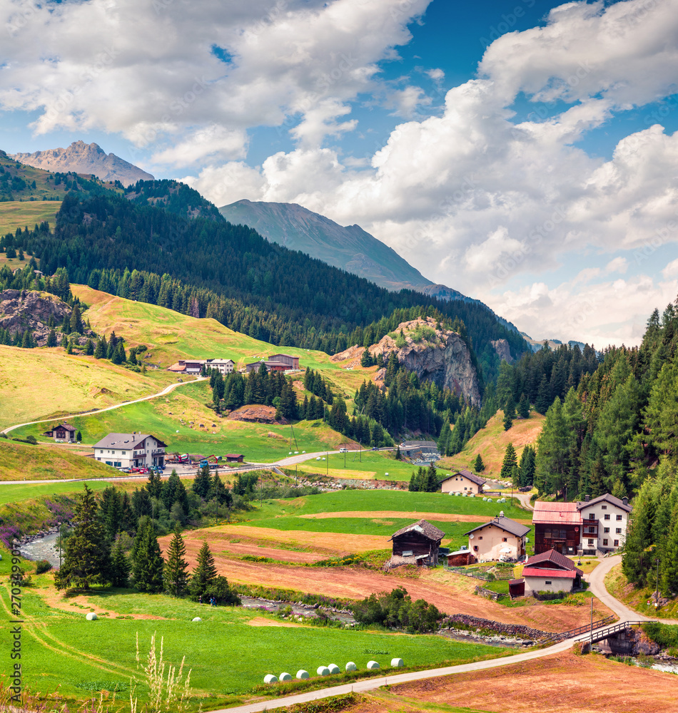 Colorful rural landscape in the Swiss Alps. Beautiful summer view of Switzerland, Europe. Beauty of nature concept background. Artistic style post processed photo. Colorful rural landscape in the Swiss Alps. Beautiful summer view of Switzerland, Europe. Beauty of nature concept background. Artistic style post processed photo.