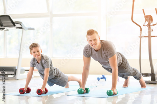 Father and son training tog...