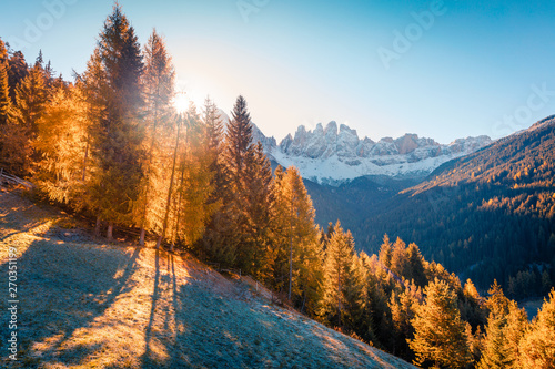 Nice view of Santa Maddalena village hills in front of the Geisler or Odle Dolomites Group. Colorful autumn scene of Dolomite Alps, Italy, Europe. Beauty of countryside concept background.
