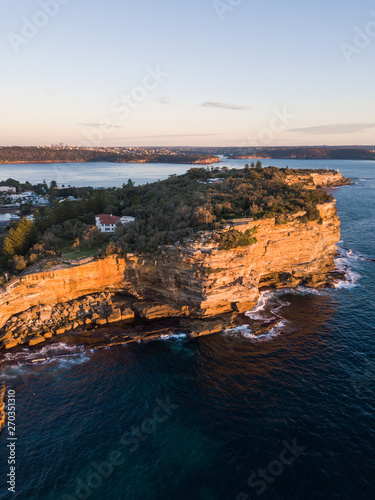 Aerial view of cliff at Sydney coastline in the morning.