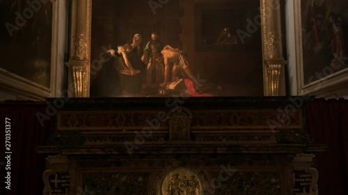 Famous Caravaggio painting in St John's cathedral in Valletta, Malta