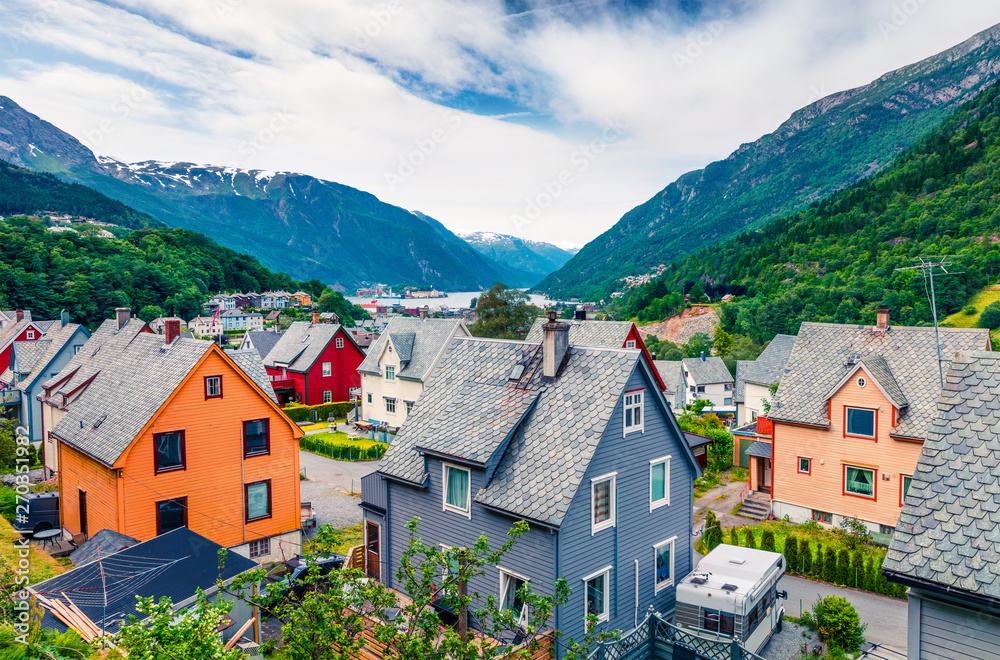 Typical Norwagian architecture in Odda town, Hordaland county, Norway. Beautiful summer view of Hardangerfjord fjord. Traveling concept background.