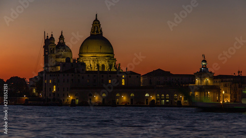 Classic sunset Venice on the Grand Canal near the Basilica of Santa Maria della Salute, Venice. Romance, travel concept