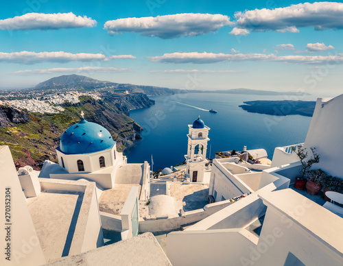 Great aerial view of Santorini island. Picturesque spring scene of the famous Greek resort Fira, Greece, Europe. Traveling concept background.