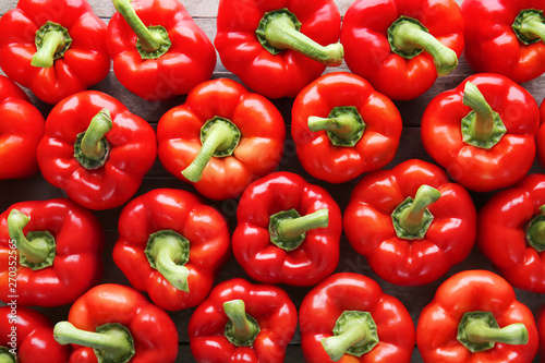 Ripe red peppers as background