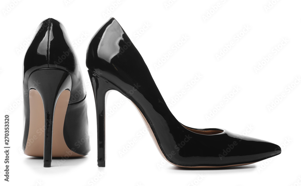 Stylish high-heeled female shoes on white background - obrazy, fototapety, plakaty 