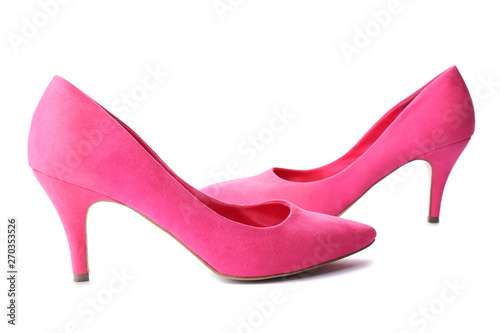 Pair of stylish high-heeled female shoes on white background