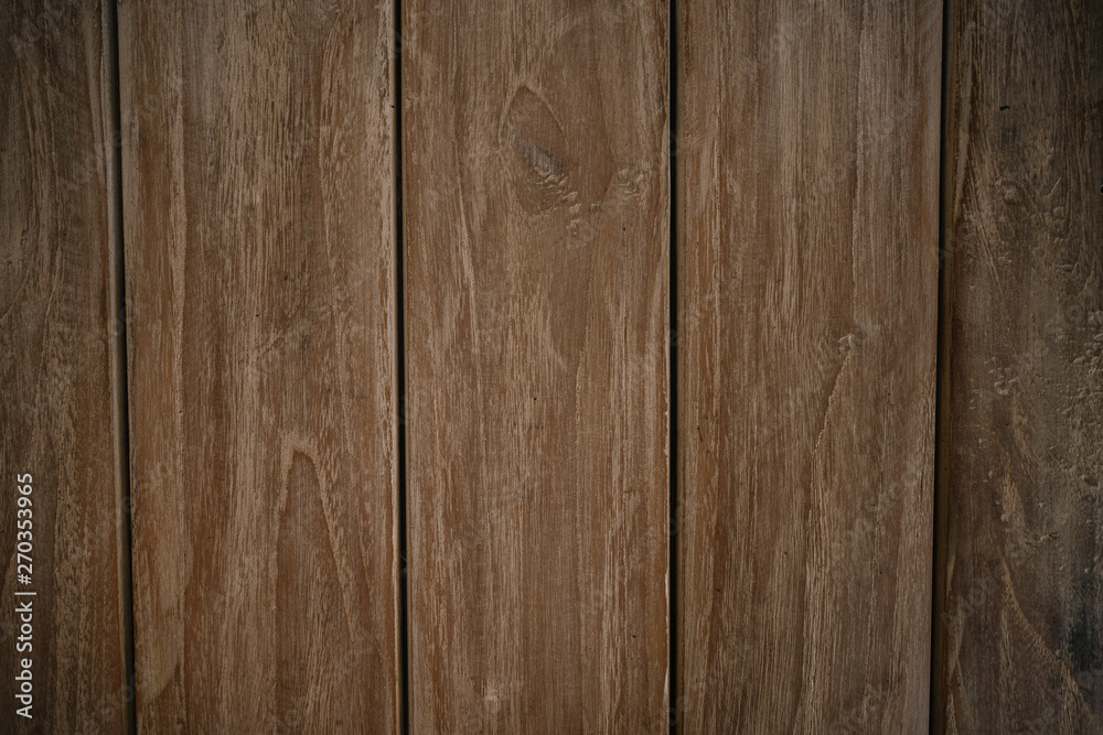 Naklejka premium Dark Brown vitage wood vertical texture natural tree background