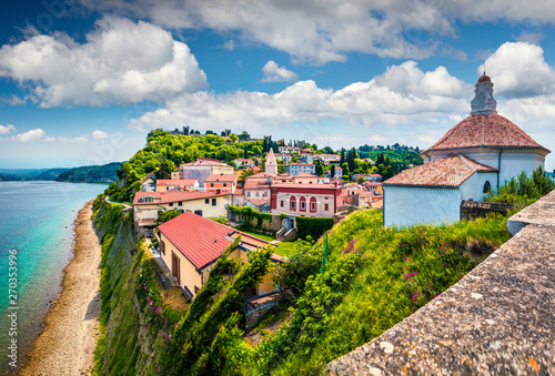 Bright view of old town Piran. Splendid spring morning on Adriatic Sea. Beautiful cityscape of Slovenia, Europe. Traveling concept background. Magnificent Mediterranean landscape. photo