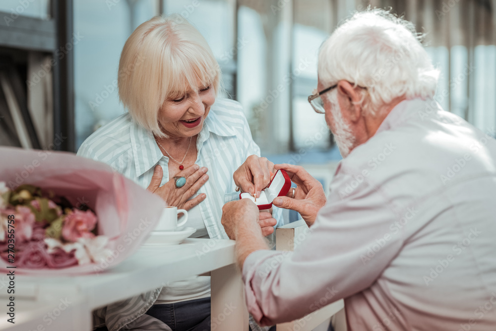 Fototapeta premium Close up of mature man that presenting ring