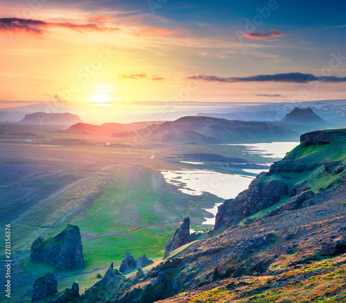 Majastic evening view from the Dyrholaey peninsula, Atlantic ocean. Summer sunset in South Iceland, Vic village location, Europe. Beauty of nature concept background. © Andrew Mayovskyy
