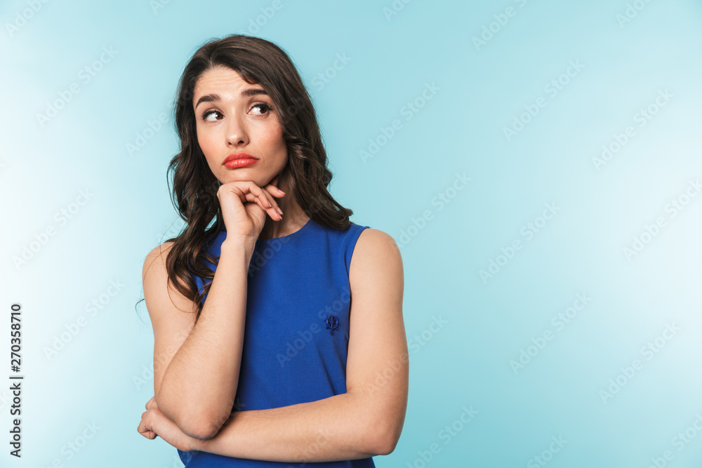 Portrait of a beautiful young brunette woman standing Portrait of a beautiful young brunette woman standing