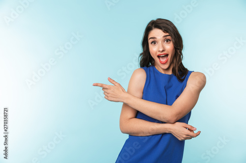 Portrait of a beautiful young brunette woman standing