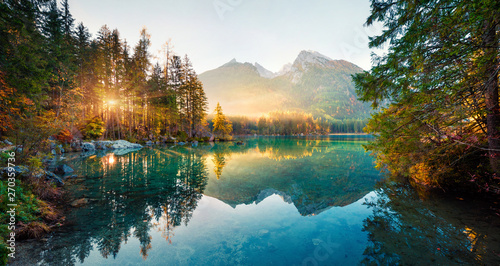 Amazing autumn sunrise of Hintersee lake. Picturesque morning view of Bavarian Alps on the Austrian border, Germany, Europe. Beauty of nature concept background. © Andrew Mayovskyy