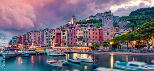 Fantastic spring scene of Portovenere town. Picturesque evening sunset of Mediterranean sea,  Liguria, province of La Spezia, Italy, Europe. Traveling concept background.