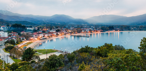 Misty spring scene of the Aegean sea. Colorful sunset of the Olimpiada town, Greece, Europe. Traveling concept background. Traveling concept background.
