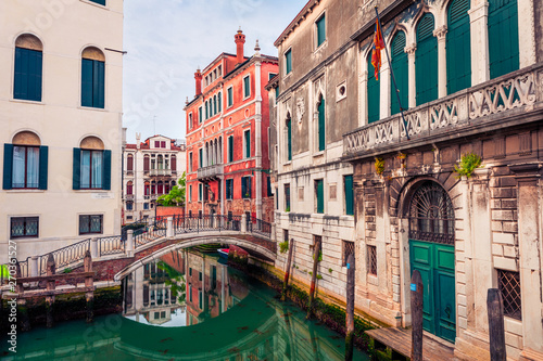 Bright spring view of Vennice with famous water canal and colorful houses. Splendid morning scene in Italy, Europe. Magnificent Mediterranean cityscape. Traveling concept background. © Andrew Mayovskyy