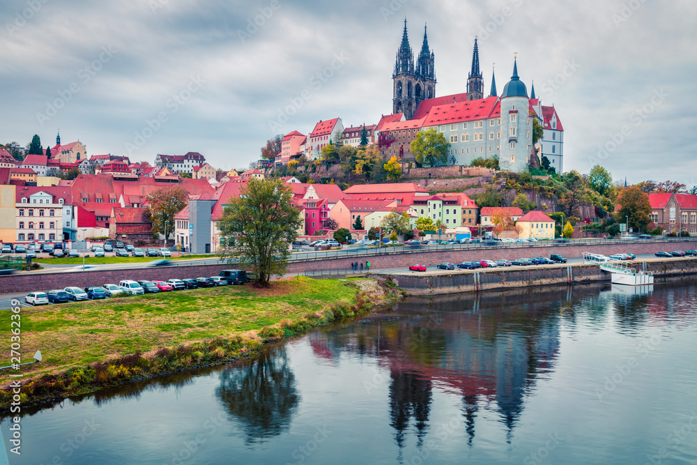 Dramatic autumn sceneof oldest overlooking the River Elbe castle - Albrechtsburg. Misty veneig cityscape of Meissen, Saxony, Germany, Europe. Traveling concept background.