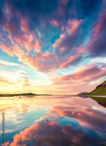 Colorful summer sunset near Grundarfjordur town. Evening scene on the Snaefellsnes peninsula  Iceland  Europe. Beauty of nature concept background.
