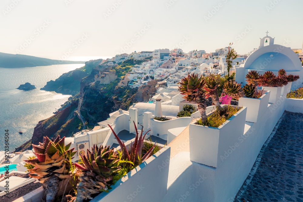 Fototapeta premium Picturesque morning view of Santorini island. Fantastic spring scene of the famous Greek resort Thira, Greece, Europe. Traveling concept background.