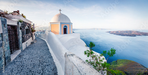 Gorgeous morning panorama of Santorini island. Picturesque spring sunrise on the famous Greek resort Thira, Greece, Europe. Traveling concept background. Artistic style post processed photo.