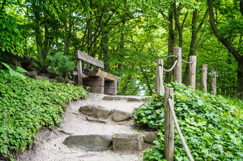 Natural stairs made of stone in a park or garden. Arrangement of nature