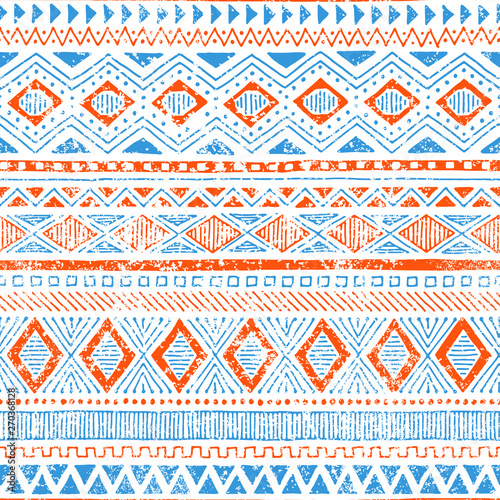 Cute ethnic seamless pattern. Tribal and aztec motifs. Grunge texture. Vintage print for textiles. Blue, orange and white colors. Vector illustration.