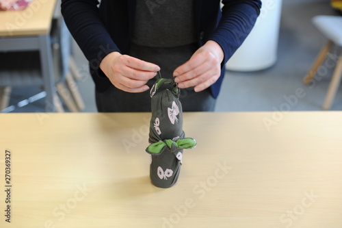 Furoshiki traditional Japanese ecological gift wrapping cloth and technique demonstration