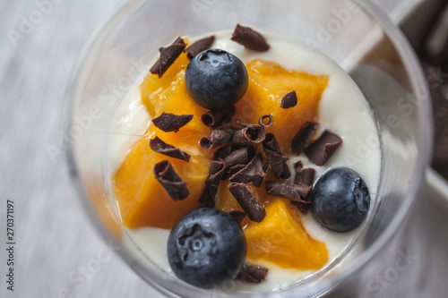 Dessert with mango and blueberry