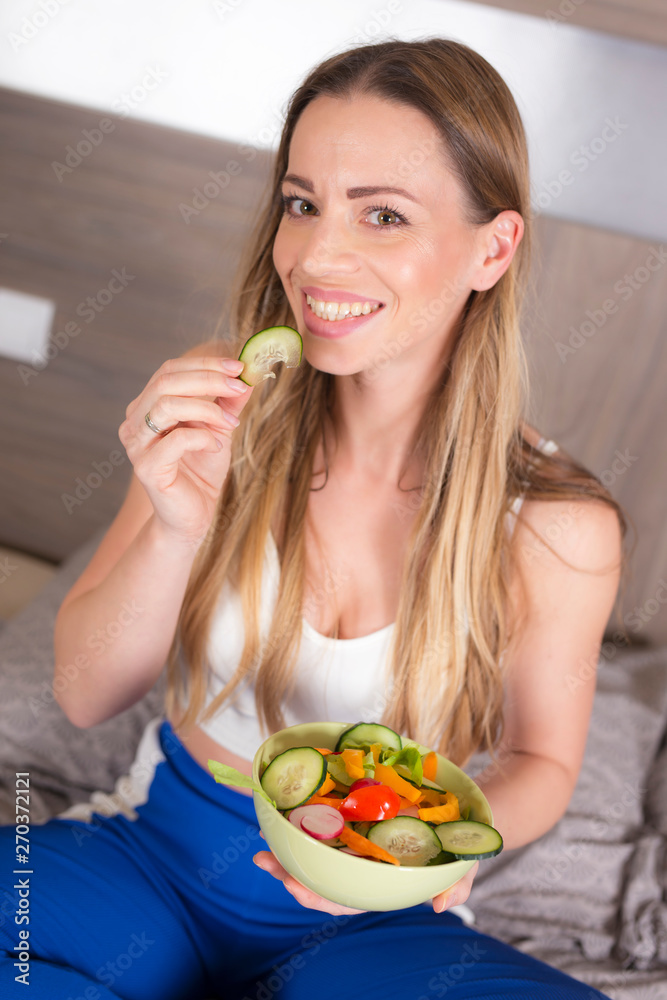 Healthy lifestyle woman eating fresh salad Healthy lifestyle woman eating fresh salad
