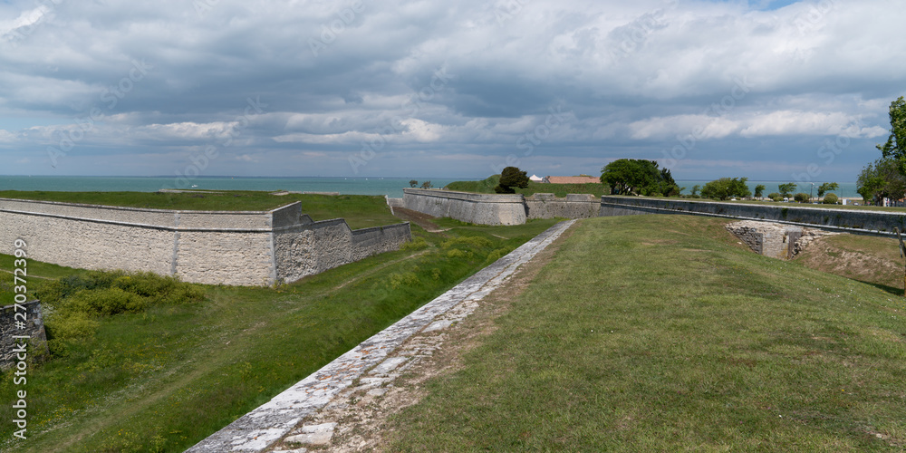 Wall of the Fortifications of Vauban in St Martin de Re Island France in web banner template