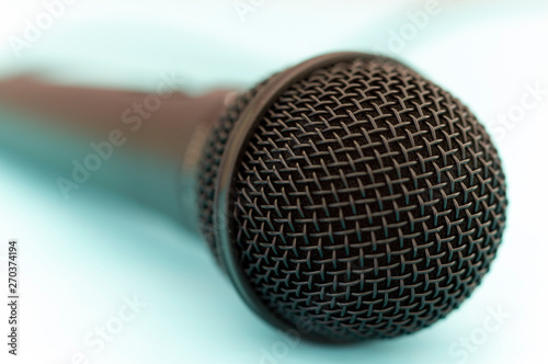 microphone close-up on wooden background