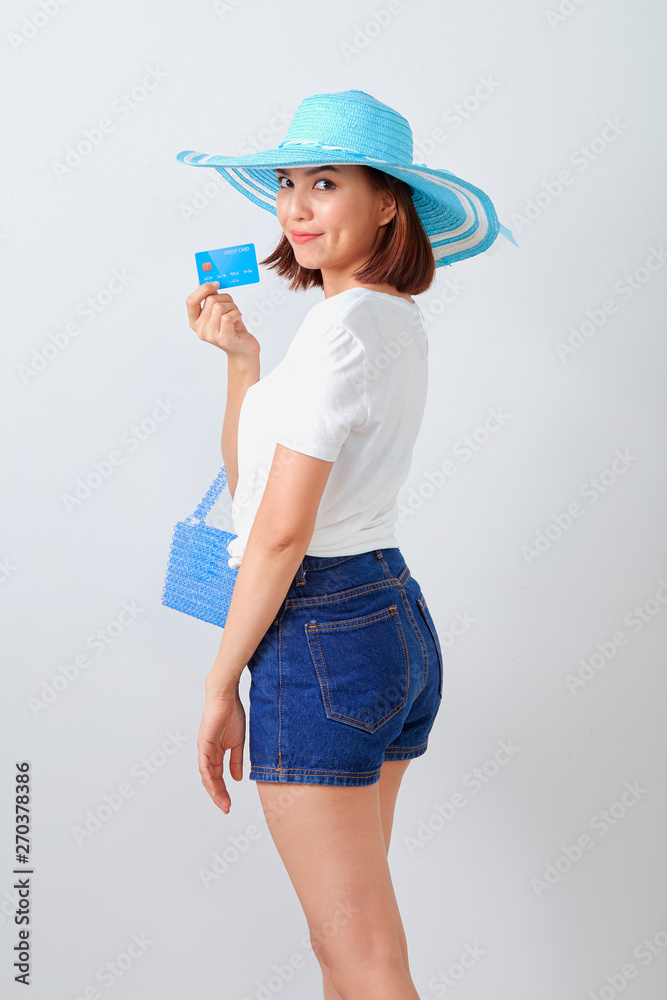 Woman holding Credit card summer holiday Woman holding Credit card summer holiday