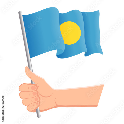 Wallpaper Mural Hand holding and waving the national flag of Palau. Fans, independence day, patriotic concept. Vector illustration, eps 10. Torontodigital.ca