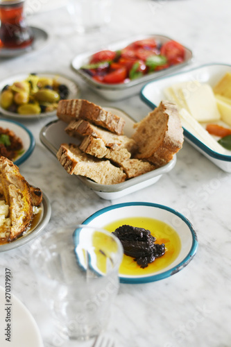Turkish breakfast with various plates on a table