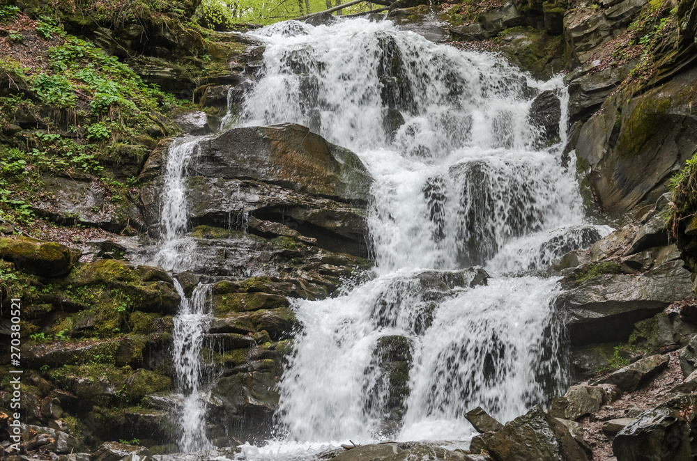 Mountain waterfall Shipot in Pylypets in the Carpathians Mountain waterfall Shipot in Pylypets in the Carpathians