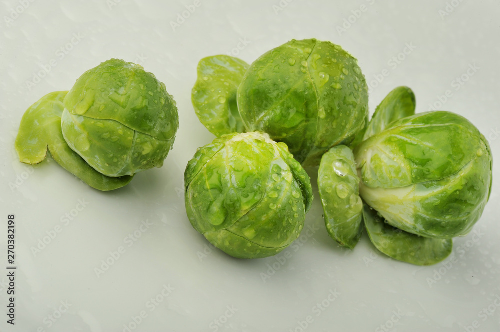 Fototapeta premium Brussels sprouts isolated on the gray background