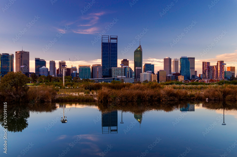 Mirror Image Reflection in Pond at Sunset with Perth City in Background