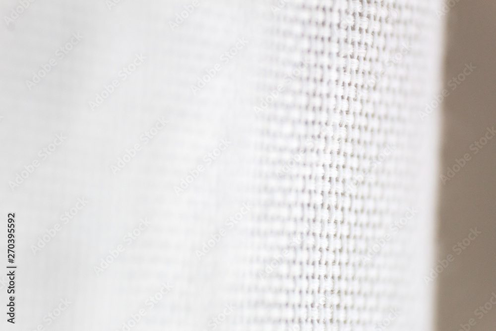 Textured background made with fabric mesh picked up in detail, close up Textured background made with fabric mesh picked up in detail, close up