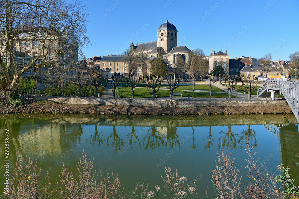 The river Sarthe with the basilica Notre Dame at Alençon of the Lower Normandy region in France The river Sarthe with the basilica Notre Dame at Alençon of the Lower Normandy region in France